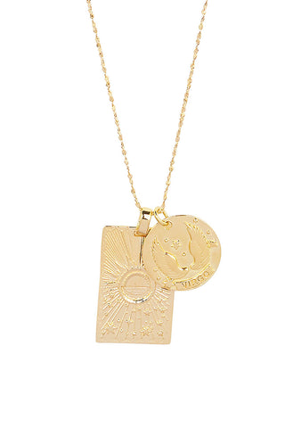 close-up-front-view-of-spell-s-virgo-stargazer-zodiac-necklace-charms-one-charm-is-of-a-rectangular-shape-and-features-a-sun-with-stars-while-the-other-charm-is-circular-and-features-the-zodiac-label-and-icon